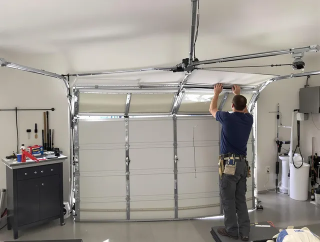 Tamarac Garage Door Repair specialist performing precise section replacement on Tamarac garage door