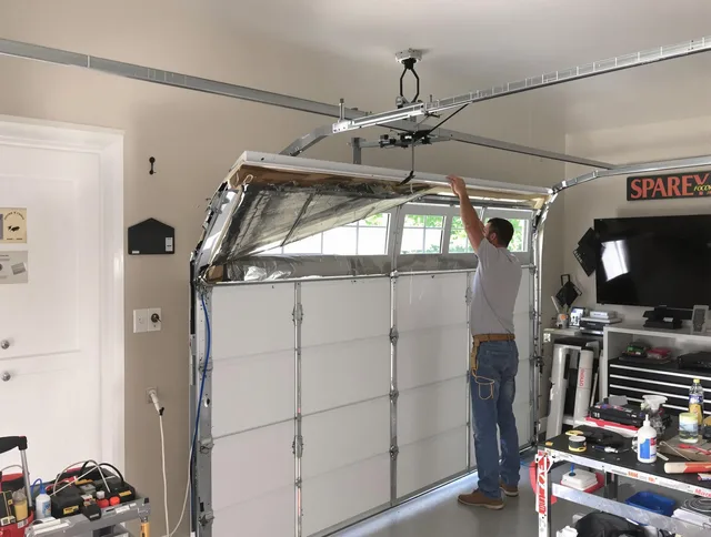 Garage door section replacement by Tamarac Garage Door Repair in Tamarac